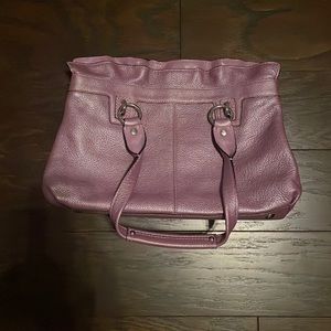 Gorgeous light purple Coach bag.  Used only once so it’s in perfect condition.